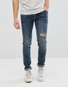 Asos Skinny Jeans In Vintage Dark Wash Blue With Knee Rip - Blue