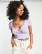 Asos Design Ribbed Wrap Top With Cap Sleeve In Lilac-purple