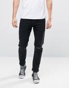 Asos Skinny Jeans With Single Busted Knee Rip In Black - Black