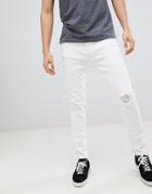 Stradivarius Rip & Repair Paneled Slim Fit Jeans In White - White