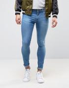 Asos Extreme Super Skinny Low Impact Jeans In Mid Blue - Blue