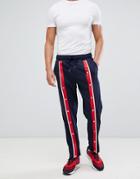 Asos Design Retro Track Tapered Joggers With Front Poppers And Stripes - Navy