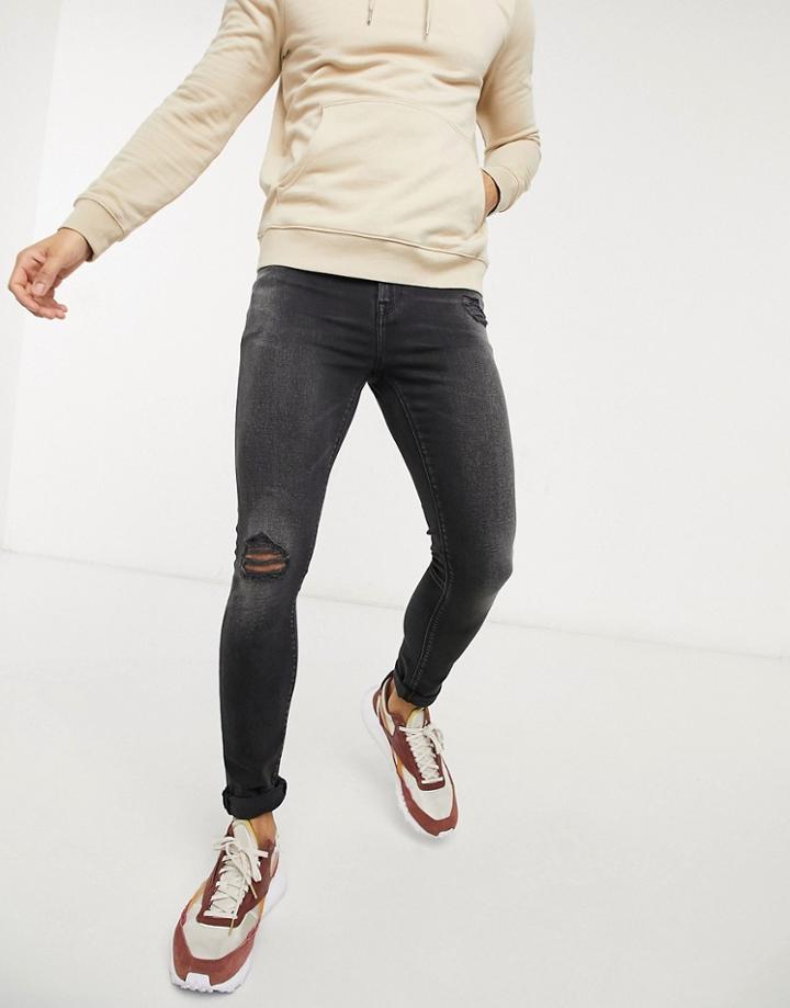 Asos Design Super Skinny Jeans In Washed Black With Abrasions
