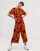 Asos Design Short Sleeve Tie Waist Jumpsuit In Red Animal Print - Multi