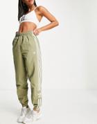 Adidas Originals Adicolor Locked Up Logo Sweatpants In Khaki-green