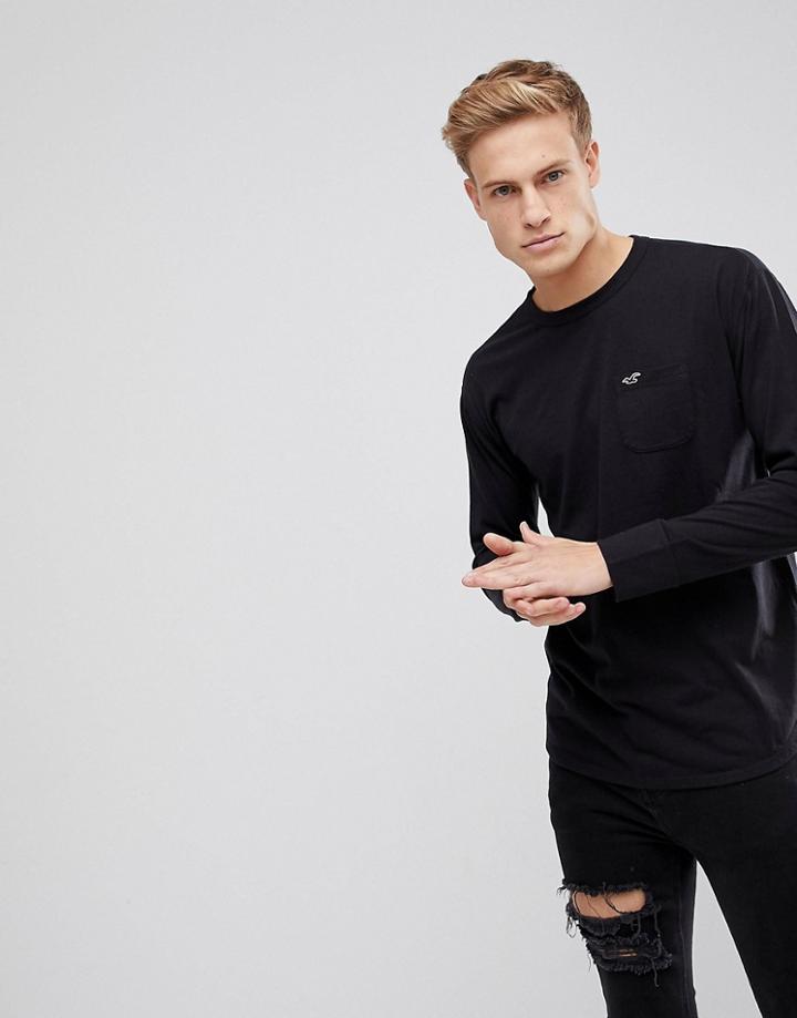 Hollister Seagull Logo Pocket Long Sleeve Top In Black - Black