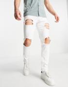 Asos Design Skinny Jeans With Heavy Rips In White