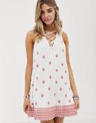 En Creme Lace Up Front Shift Dress In Border Print - White