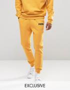 Puma Skinny Lounge Joggers In Yellow Exclusive To Asos - Yellow