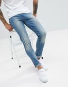Noak Skinny Jeans In Mid Wash - Blue