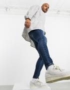 Asos Design Spray On Jeans With Power Stretch In Dark Wash Blue-blues