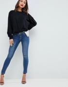 Asos Design Whitby Low Rise Skinny Jeans In Dark Stone Wash-blue
