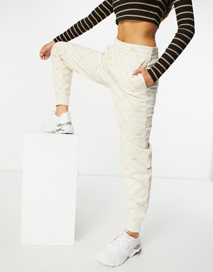 Lacoste Monogram Logo Sweatpants In Cream-white