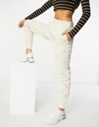 Lacoste Monogram Logo Sweatpants In Cream-white