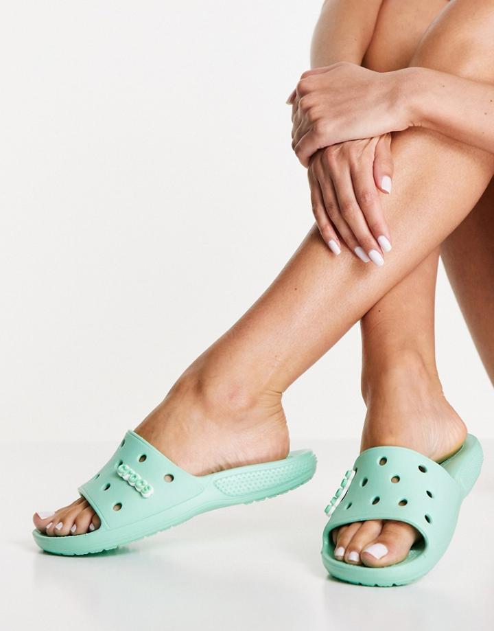 Crocs Classic Slide Flat Sandals In Pistachio-green