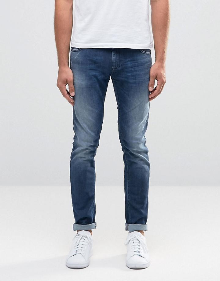Sisley Super Skinny Distressed Jeans In Mid Wash Blue - Blue