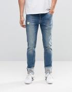 Asos Skinny Jeans With Turn Ups And Rips - Blue