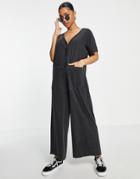 Asos Design Washed Button Through Oversized Jumpsuit In Charcoal-gray