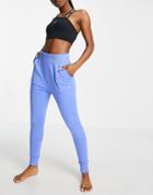 Nike Yoga Tight Fit 7/8 Fleece Sweatpants In Blue-blues