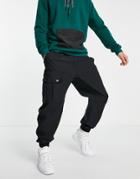 Adidas Utility Sweatpants With Front Pocket In Black