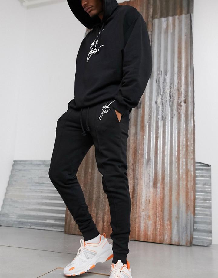 Asos Design Two-piece Skinny Sweatpants With Placement Print With Dark Future Logo-black