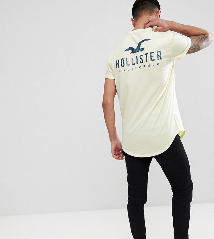 Hollister Front And Back Logo Print T-shirt Curved Hem In Yellow Exclusive To Asos - Yellow