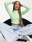 Asos Design Zip Through High Neck Top In Wavy Texture-green