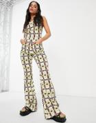 Asos Design Halter Neck Jumpsuit With Flare Leg In Geo Print-multi