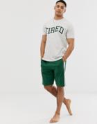 Asos Design Lounge Pyjama Short And Tshirt Set With Side Stripe And Tired Slogan-green
