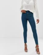Asos Design Ridley High Waisted Skinny Jeans In Mid Wash With Green Tint-blue