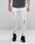 Asos Tapered Jeans With Mega Rps In White - White
