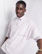 Asos Dark Future Oversized Short Sleeved Polo Shirt In Pink With Logo Print