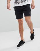 Religion Jersey Shorts In Black With Metal Badge - Black