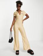 Asos Design Collar Zip Front 70s Ribbed Jumpsuit In Stone-neutral