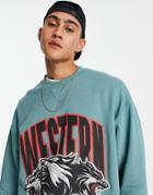 Asos Design Oversized Sweatshirt In Blue With Varsity Wolves Print-blues