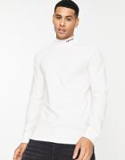 Calvin Klein High Neck Logo Stretch Slim Fit Long Sleeve Top In Cream-white