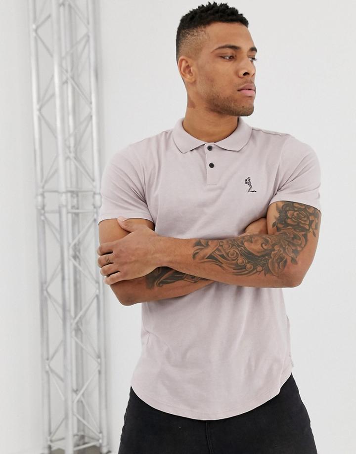 Religion Polo Shirt With Curved Hem In Ash Pink - Pink