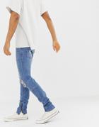 Religion Skinny Fit Jeans With Ripped Knee And Zip Hem - Blue