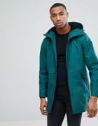 Asos Shower Resistant Rain Coat With Fleece Hood In Bottle Green - Green