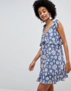 Asos Design Tie Strap Sundress With Pep Hem In Floral Gingham - Multi