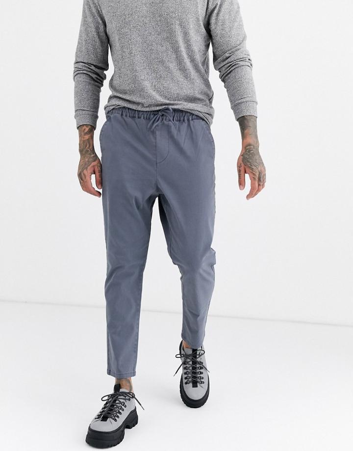 Asos Design Tapered Chinos With Elastic Waist In Washed Blue