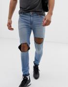 Asos Design Super Spray On Jeans In Light Blue With Open Rips - Blue