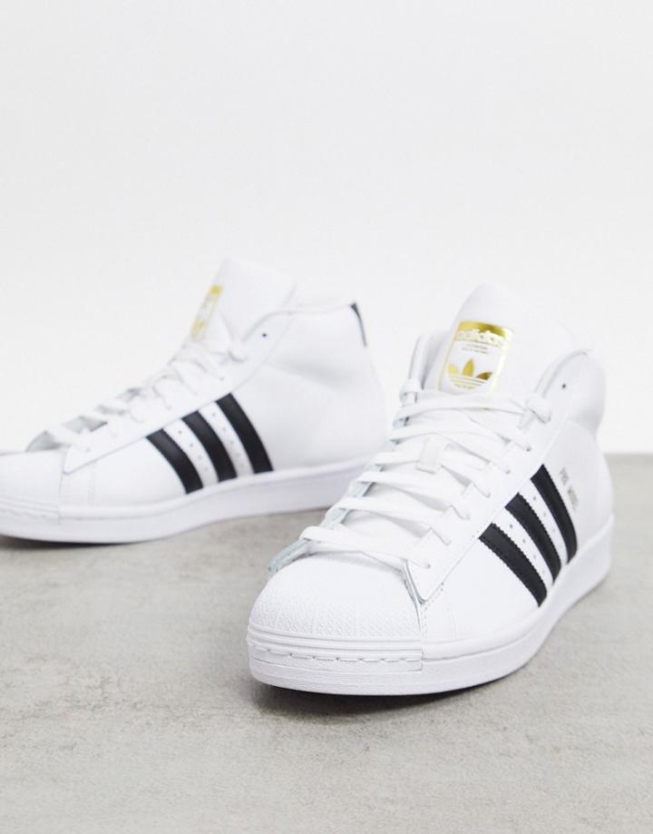 Adidas Originals Pro Model Hi Top Sneakers In White Leather