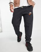Nike Trend Fleece Zip Cuffed Retro Logo Sweatpants In Black