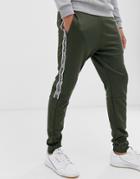 Hollister Leg Logo Side Piping Cuffed Sweatpants In Olive-gray