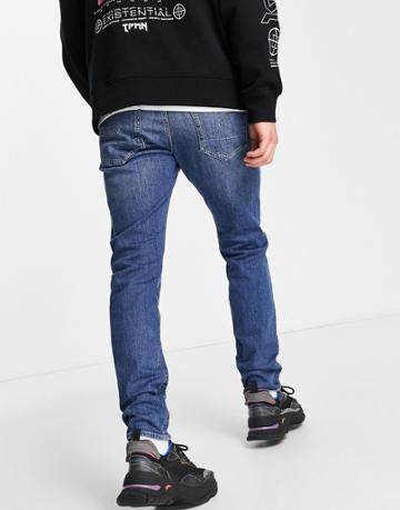 G-star Revend Fwd Skinny Distressed Jeans In Midwash-blue