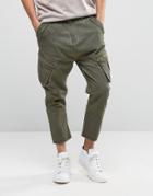 Asos Drop Crotch Cargo Pants With Raw Hem In Washed Khaki - Green