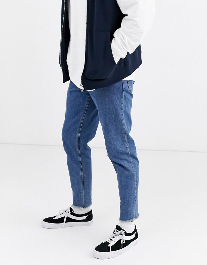 Asos Design Classic Rigid Jeans In Mid Wash Blue With Frayed Hem