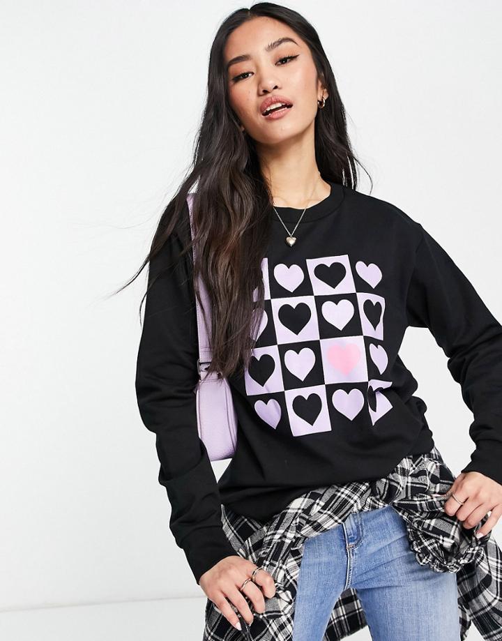 Asos Design Sweatshirt With Checkerboard Heart Print In Black