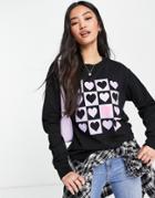 Asos Design Sweatshirt With Checkerboard Heart Print In Black
